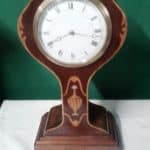 Edwardian inlaid mahogany tulip mantle clock 19th century Antique Clocks