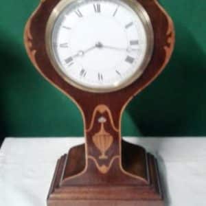 Edwardian inlaid mahogany tulip mantle clock 19th century Antique Clocks