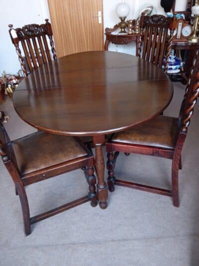 A WELSH DARK OAK DINING TABLE (FOLDING) OVAL SHAPE with 4 CHAIRS Antique Chairs 4