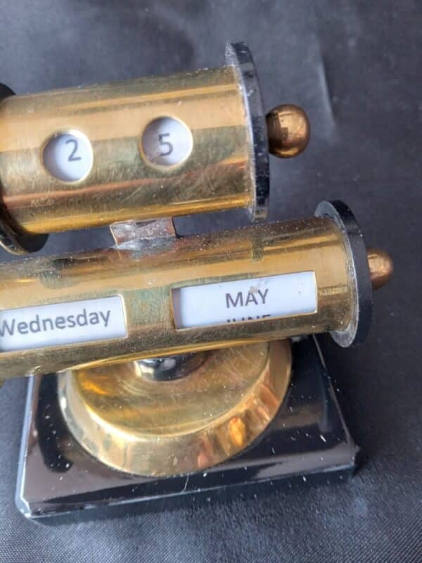 AN UNUSUAL PERPETUAL CALENDAR 2 TIER in BRASS on SLATE BASE. - Image 2