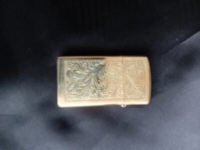 A BRASS 'ZIPPO' LIGHTER 1940's