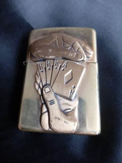A 'ZIPPO' LIGHTER 1940's MADE in the USA. of BRASS--I BELIEVE A RARE ITEM.