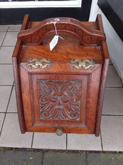 AN ITALIAN, HEAVILY CARVED COAL BOX.