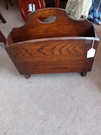 A HEAVY OAK MAGAZINE/NEWSPAPER RACK 1930's.