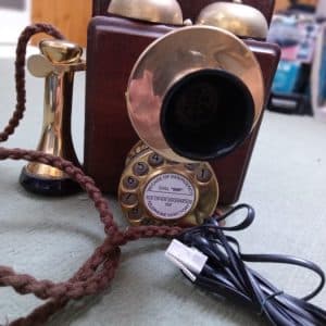 Here is a GPO 1921 Wall Mounted Telephone--It has been brought to a fine restorastion. The Brass shines and it has been converted so it works on todays system. This would look proud on any wall be it either a Restaurant--Hotel--Shop--or a Home----maybe your's FREE SHIPPING IN THE UK--FOR OVERSEAS ASK FOR A QUOTE. There is one similar to this being advertised on Ebay-which has not been tested--being offered at £395. This is working and in better condition!FREE DELIVERY IN THE UK! PRICE REDUCTION to £215 FREE DELIVERY IN THE UK!