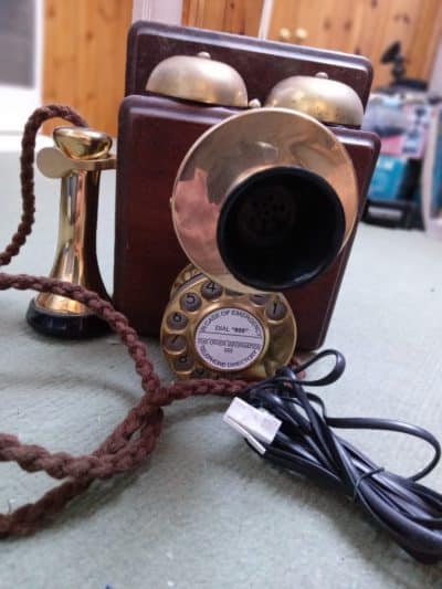 Here is a GPO 1921 Wall Mounted Telephone--It has been brought to a fine restorastion. The Brass shines and it has been converted so it works on todays system. This would look proud on any wall be it either a Restaurant--Hotel--Shop--or a Home----maybe your's FREE SHIPPING IN THE UK--FOR OVERSEAS ASK FOR A QUOTE. There is one similar to this being advertised on Ebay-which has not been tested--being offered at £395. This is working and in better condition!FREE DELIVERY IN THE UK! PRICE REDUCTION to £215 FREE DELIVERY IN THE UK!