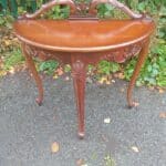 A DEMI-LUNE SIDE TABLE. tables Antique Furniture