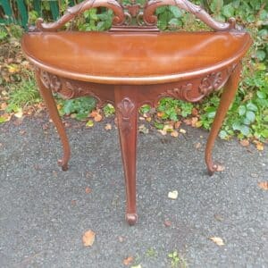 A DEMI-LUNE SIDE TABLE. tables Antique Furniture