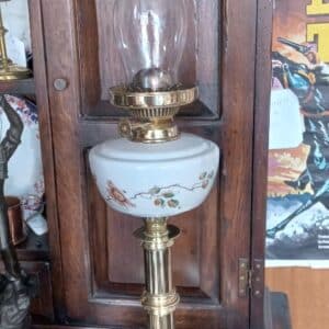 A BRASS COLUMN VICTORIAN OIL LAMP with CERAMIC RESERVOIR. (1870/80’S) Bedroom Antiques