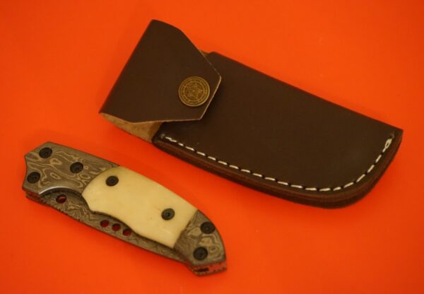 An As New Hand Made Damascus Bone Handle Folding Knife – Leather Sheath / Carbon Steel Blade / Collectable