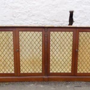 SOLD A Regency mahogany stained four door bookcase cabinet. Antique Antique Bookcases