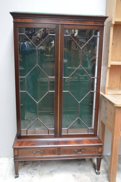 Edwardian mahogany glass shelve cabinet