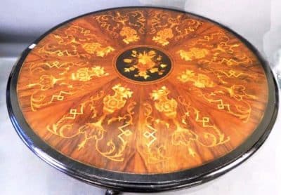 Victorian walnut centre table with eight sectioned marquetry top.