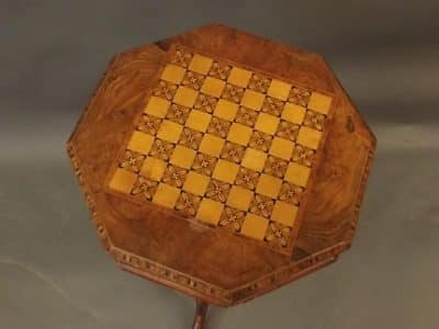 A Victorian parquetry inlaid trumpet table.