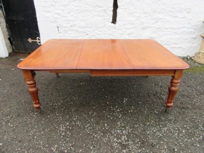 Wide Victorian mahogany extending dining table