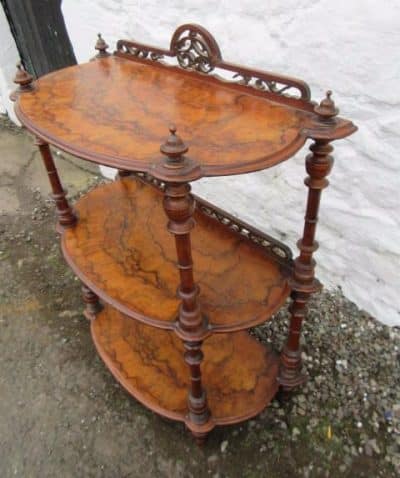 Victorian figured walnut three tire wotnot