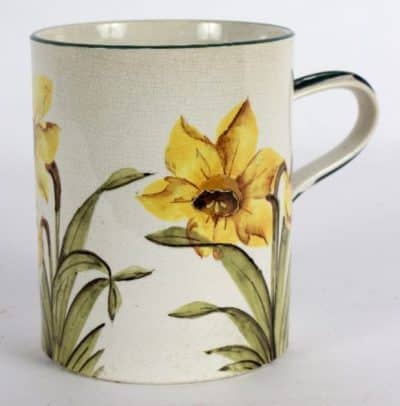 A Wemyss mug painted daffodils within green borders - Image 2