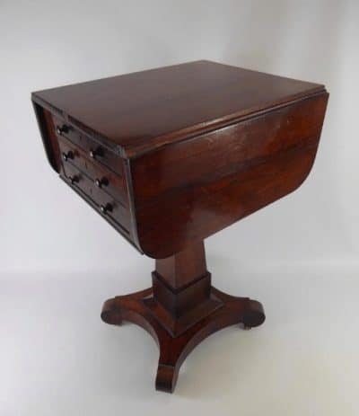 Victorian rosewood three drawer pedestal side drop leaf table.