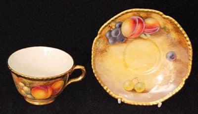 SOLD A Royal Worcester Fruits coffee cup and saucer,