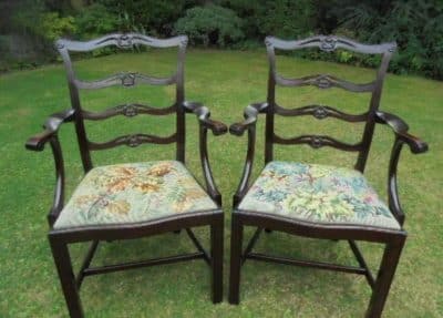 Pair Georgian style mahogany carved ladder back carver chairs