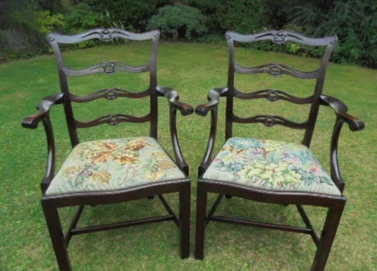 Pair Georgian style mahogany carved ladder back carver chairs