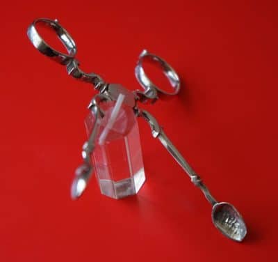 A Pair of Victorian White Metal Sugar / Ice Tongs