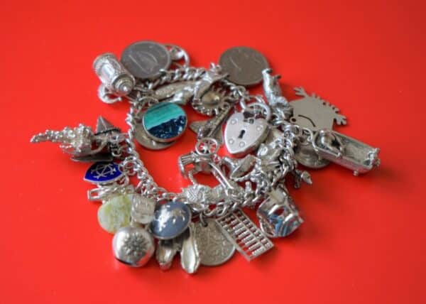 UK A Vintage 1963 Heavy Silver Charm Bracelet With 38 Silver Charms - Ideal Birthday Present / Boxed - Image 2