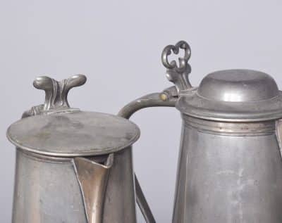 Seven Large Pewter Flagons - Image 2