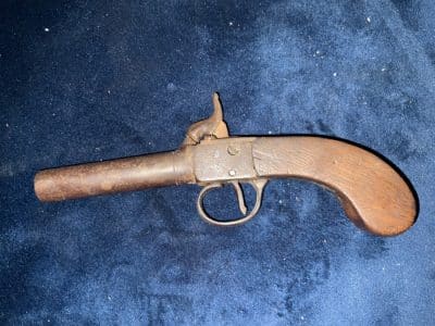 Pistol percussion pocket.