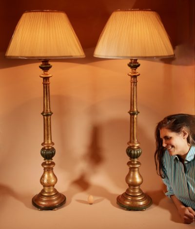 A Pair Of Very Decorative Italian Renaissance Style Turned And Carved Gilded Wooden Standard Lamps.