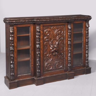 Mid-Victorian Flemish Profusely Carved Breakfront Glazed Bookcase
