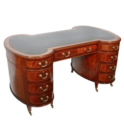 An ‘Hour Glass’  shaped mahogany partner’s desk
