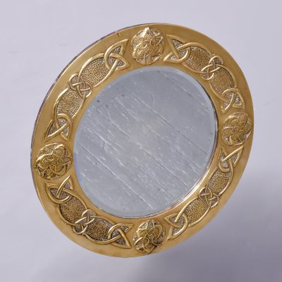 Decorative embossed brass Glasgow-style circular wall mirror