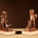 Black Forest Original Pair Of Fine carved Sculptures Of A Boy And Girl. Black forest Antique Sculptures