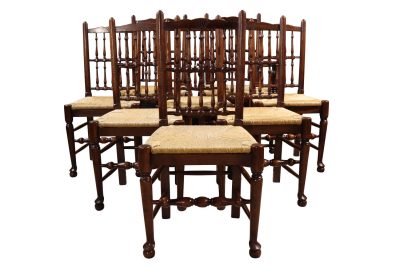 Set of 8 Oak Spindle Back Dining Chairs Including Two Carvers 20thc