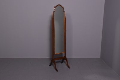 Neat- sized Queen Anne-style mahogany cheval mirror.