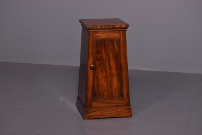 Mid Victorian metronome-shaped bedside locker in figured Spanish mahogany