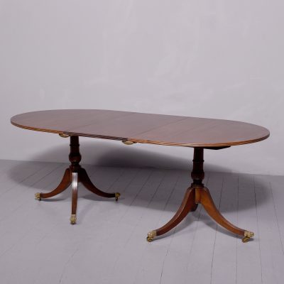 George III style pedestal mahogany dining table with additional leaf