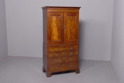 Neat-sized George III mahogany linen press with lovely colour and patina.