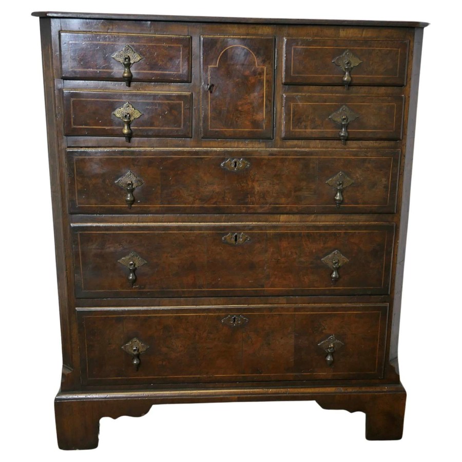 A Fine Bur Walnut and Oak Chest of Drawers The chest has can unusual combinatio