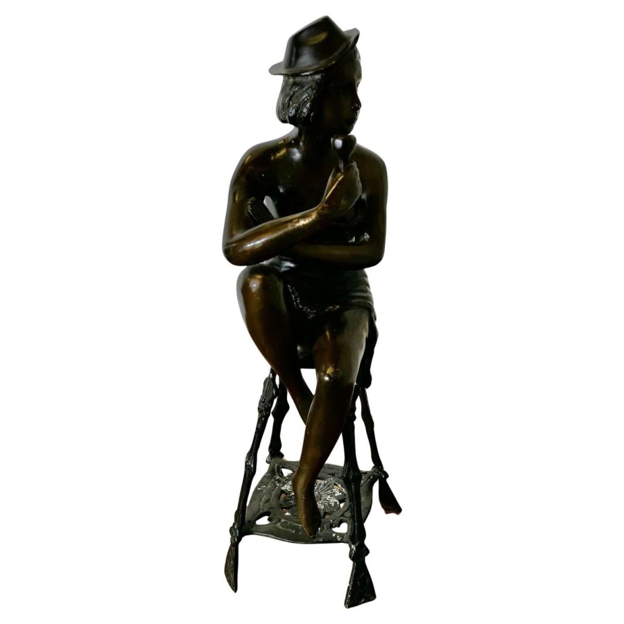 Bronze Statue of a Girl on a Stool Drinking Champaign