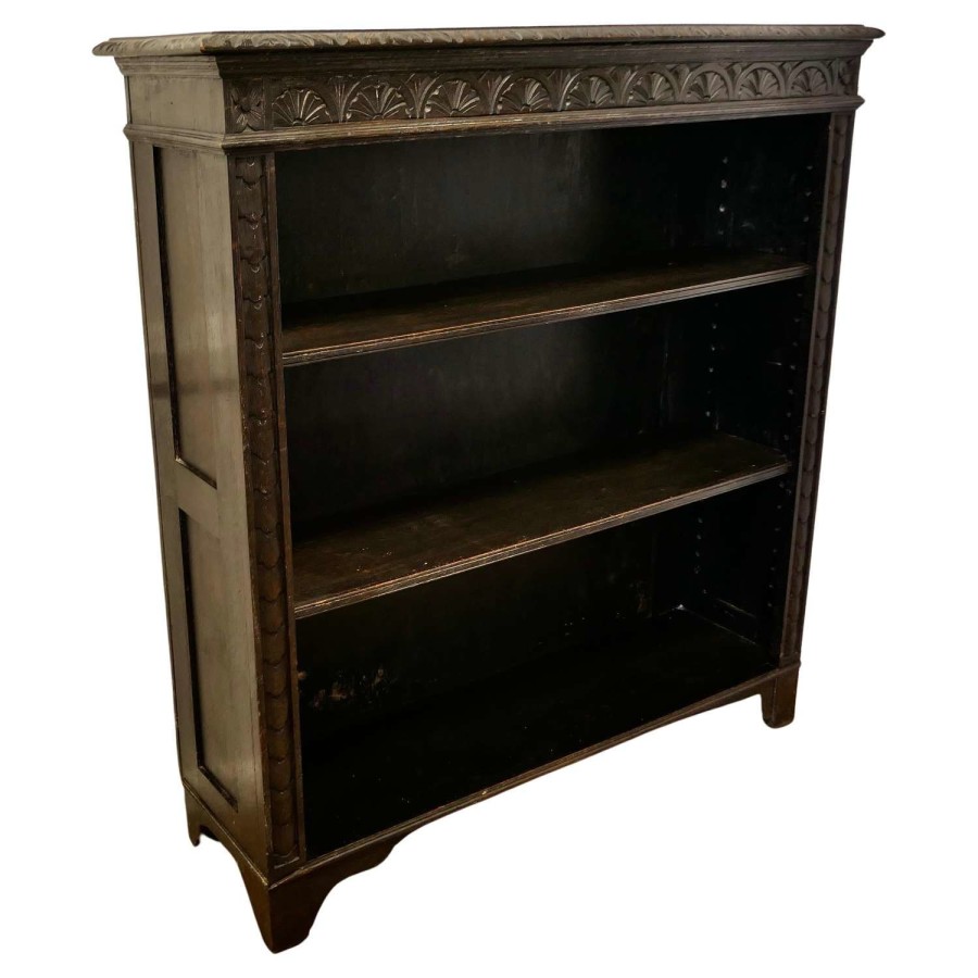 Carved Oak Open Bookcase. The bookcase is good quality, with attractive carving