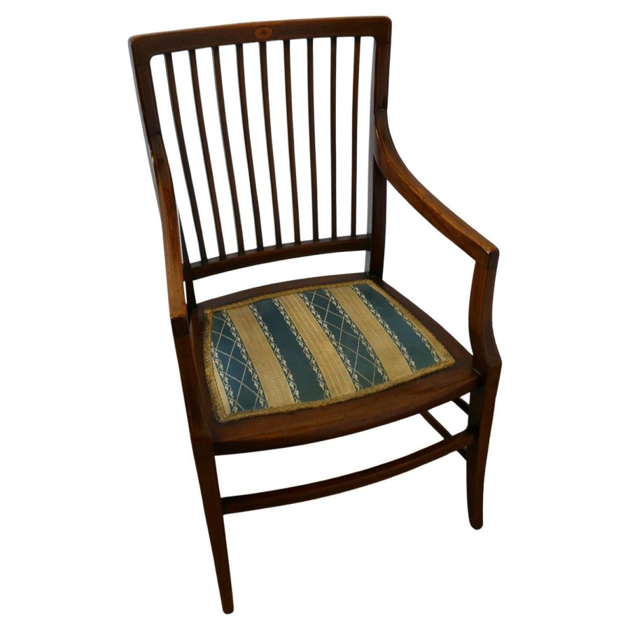 Regency Style Childs Arm Chair This is a 19th Century chair with an upholste