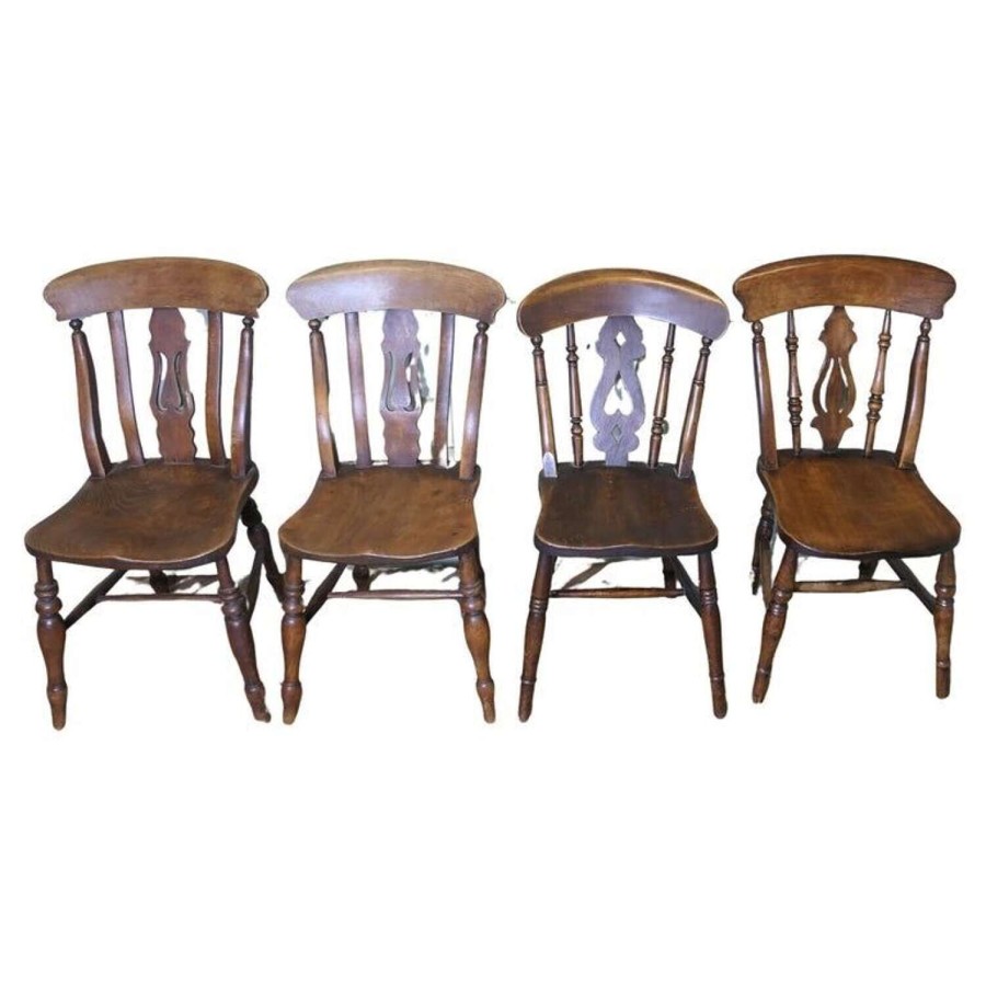 A Harlequin Set of 4 Beech & Elm Fiddle Back Chairs