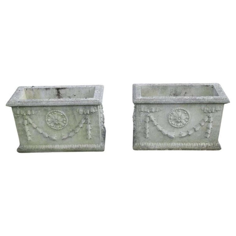 A Pair of Large Weathered Decorative Rectangular Planters