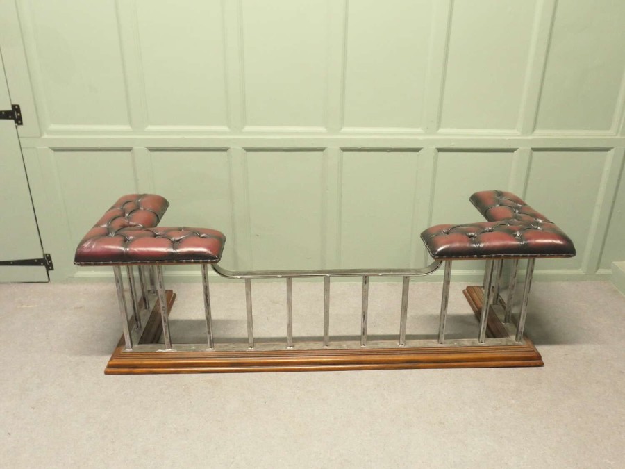 A Large Heavy Victorian Brass Club Fender Set on Wood
