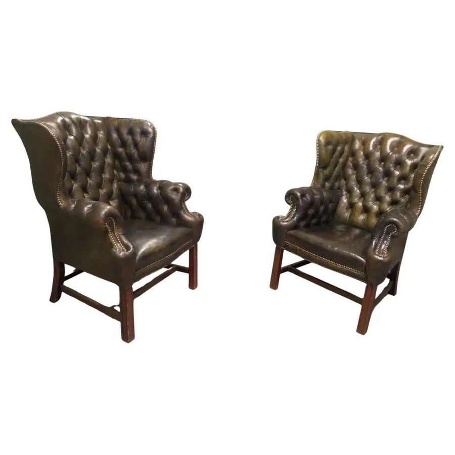 A Pair of Georgian Style Gentleman’s Wing Back Leather Chesterfield Chairs