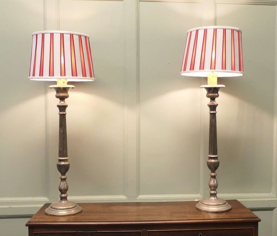 A Pair of Large Silver Plated Table Lamps