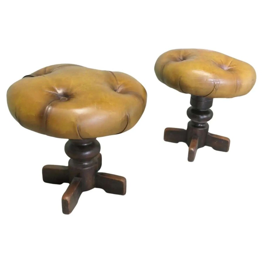 A Pair of Sturdy French Button Leather Swivel Stools