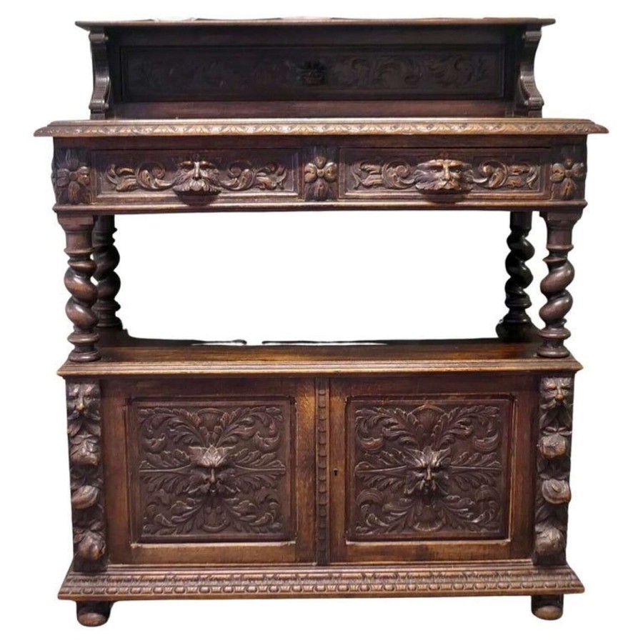 A Superbly Carved Green Man Oak Side Board or Buffet